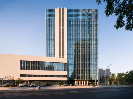 Anji Jiuzhou Changshuo Square Yaduo Hotel Отели рядом с достопримечательностью «CPC Anji County Committee Party School»