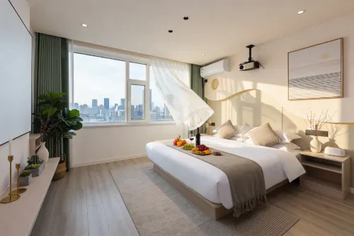 Yunduo · Designer Intelligent Cinema Homestay (Yanji Yanbian University West Market Branch) - رومانسي