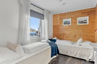 Astra Whale - Waterfront Boutique Hostel in Lofoten - parking