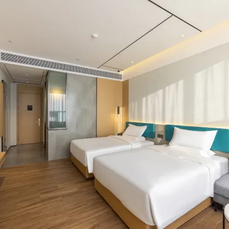 CHEERMAY Hotel (Longnan High-Speed Railway Station Wanda Plaza) Отели в г. Луннань