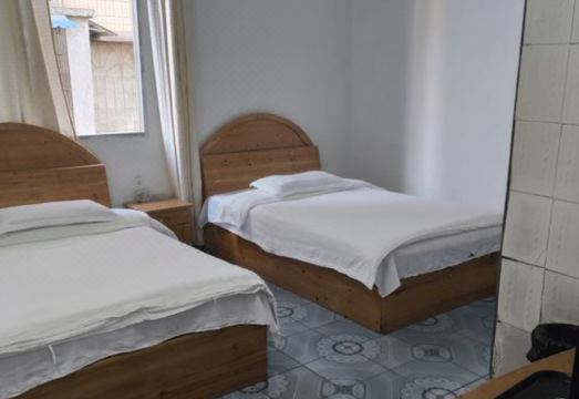Longsheng Xinji Hotel - Housity