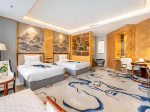 Zhangye Metropolis Holiday Hotel (High-speed Railway West Station Bell and Drum Tower)