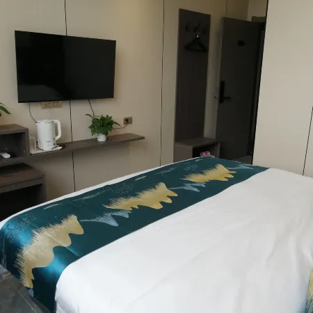 Meixian Qishangge Hotel