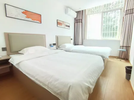 Huatuo Business Hotel Отели рядом со станцией Feixianbei Railway Station