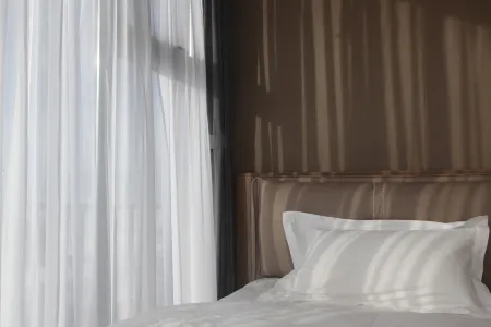 Xinyuan Sanshan Homestay (Xinyuan Nalati Airport) Отели в г. Синьюань