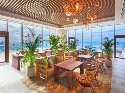 호텔 알라 쿠주 오키나와의 세련된 객실 내부 이미지