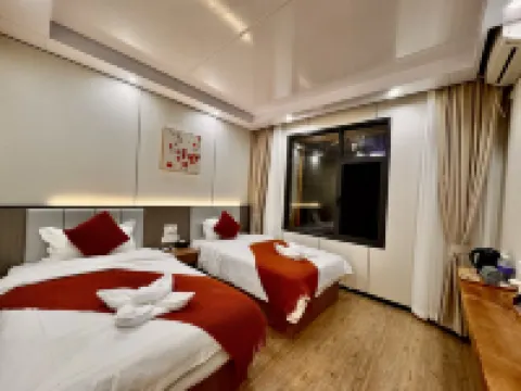 Mingcai Hotel (Siguniangshan Scenic Area)