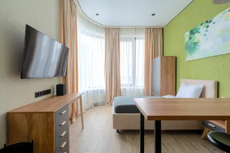 Апарт-отель Винтерфелл Стрешнево Отели рядом с достопримечательностью «Самый высокий цилиндрический аквариум в мире»