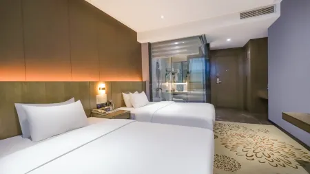 Xianglong Boutique Hotel (Guangzhou North Railway Station Huacheng Road Subway Station)