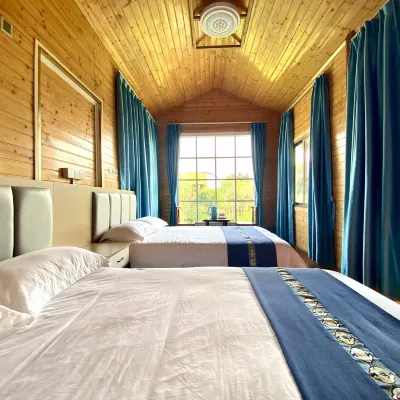 Foshan Qinqin Holiday Homestay โรงแรมใกล้อาณาจักรป่าหนานด่าน