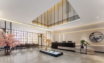 Moshang Light House Hotel (Zhengzhou South China City Longhu Jinyicheng Shopping Center)