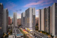 One Gem Hotel Отели рядом с достопримечательностью «Хайнаньский институт по политическому праву»