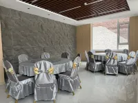 Mòsháng Riverhouse Blossoms Hotel - sarapan