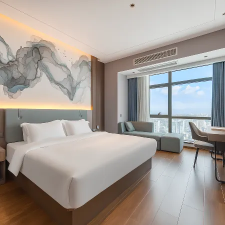 Manyue Art Hotel (Yichun Municipal Government Railway Station) Отели рядом с достопримечательностью «Yichun University Vocational and Technical College»