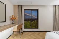Guiyang Qianshan Heyue Hotel (Huaxi College Town) - جاكوزي