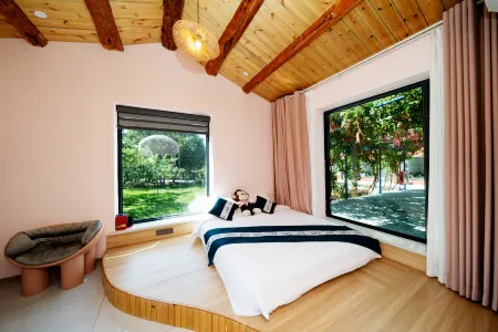 Qingyuan Mei She homestay Отели рядом с достопримечательностью «Xinyi Self-Drive Campground (Sayram Lake Branch)»