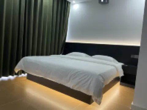 Xiaoshihou Homestay (Wanda Plaza) Hotel a Jingyang