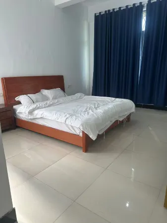 Huiting Apartment Отели в г. Юньсяао