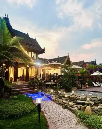 Xishuangbanna Jinghong Fanhua·Zhijing Holiday Courtyard Отели рядом с достопримечательностью «Menghanman Tingfota Temple»