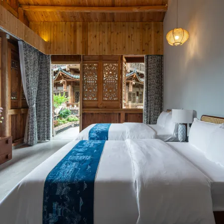 Xingyi Qiangu Jiuye Bed and Breakfast (Fenglin Buyi Scenic Area Branch)