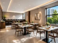 Yihe Spring Hotel (Yueqing Times Square) - พร้อมอาหารเช้า