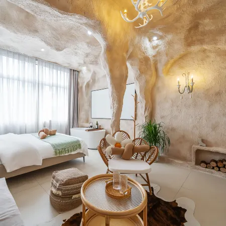 Qianxun Designer Homestay (Dengzhou Guangyi Sleepless City Branch)