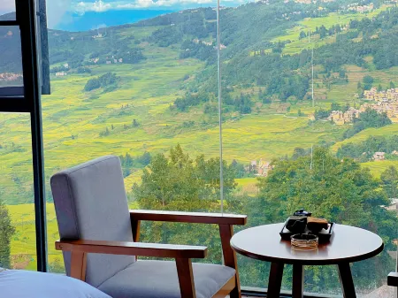 Yuanyang Tianchi Tianyuan Chinese Inn Отели рядом с достопримечательностью «Laohuzui Terraced Field Scenic Area»