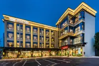 錦龍富華飯店（坪山高鐵站店） 坪山體育中心體育館-羽毛球館附近的飯店