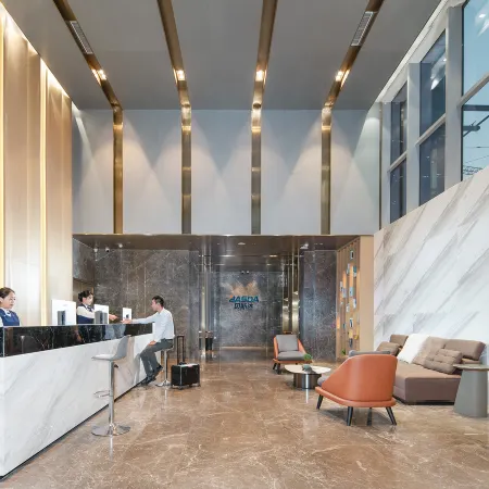 Zhuxin Hotel (Baolong Subway Station Branch) Отели рядом с достопримечательностью «Biadi Share Co. ООО.»