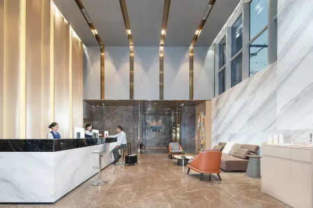 Zhuxin Hotel (Baolong Subway Station Branch) Отели рядом с достопримечательностью «Baoneng All City Shopping Center Longgang Branch (Jianshe Road)»