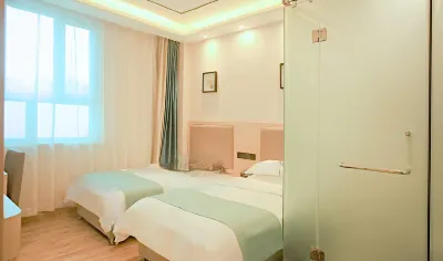 Shell Hotel (Urumqi Midong Tonghui Ershouche Shichang) Hôtels à : Ürümqi