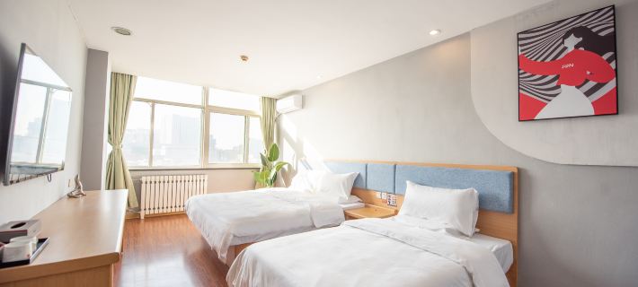 Junyi Chain Hotel (Weifang Railway Station Taihua City Store) Hotéis em Weifang