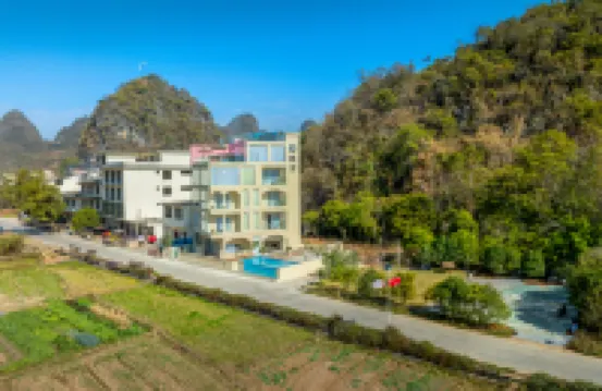 โฮมสเตย์เชียหนาน หยางซั่ว (สาขา ท่าเรือจิ่วเซียน แม่น้ำหยู่หลง)