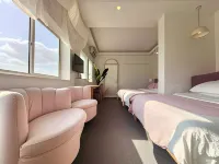 Floral Hotel·Guihai Lazy Cat Holiday Guesthouse (Putao Beach Location) - maisons de vacances
