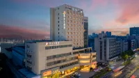 Oriental Grand Hotel (Tongxiang Central Wanxianghui Store) Hotels near Puyuan Fashion Ancient Town Tourist Service Center Entrance
