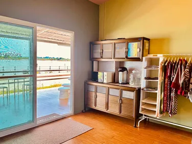 รูปภาพของนกฮูกริมโขง · Green House