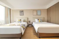 Wanhui City Hotel (Nanjing Jiangbei New Area University of Technology Branch) - Holiday Apartments