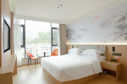Wenlan Qimeng Hotel (Xuan'en Wenlan Bridge)