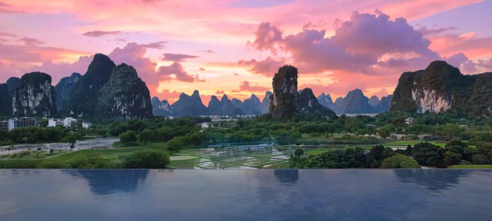 Julong Town Resort Hotel (Yulong River Store, Shili Gallery, Yangshuo) Отели в г. Яншуо