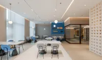 Homelnn Neo Ningbo Jiangbei Wanda  Olympic Sports Center Hotel - servizio colazione