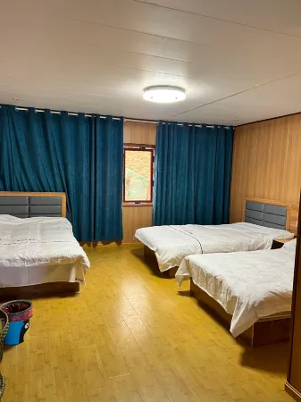 Kangding Muya Inn Отели рядом с достопримечательностью «Quanhua Shoal»