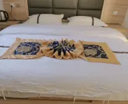 Shuangbai Damai Dikangjia Inn - พร้อมWifi