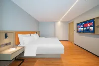 希曼智慧酒店(茂名高鐵站文化廣場店) 鄰近石鰲塘榕園燈光夜市的酒店