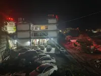 Jianqi Yang Family Courtyard Homestay - parcheggio