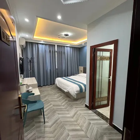 Muli Xinsheng Business Hotel