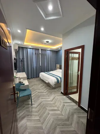 Muli Xinsheng Business Hotel Отели в г. Мули