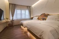 Liaoliaoxin Hotel (Qujing Nanzhong Cuancheng)