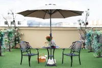 Fuying Hotel (Baoshan Station Wuzhou International Plaza)