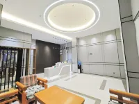 Beiliu Tian Tian Jie Bao Hotel (Beiliu Bus Station Pedestrian Street Food City Store)