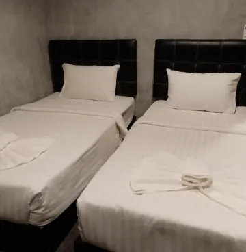 ห้องดีลักซ์ เตียงแฝด มีระเบียง